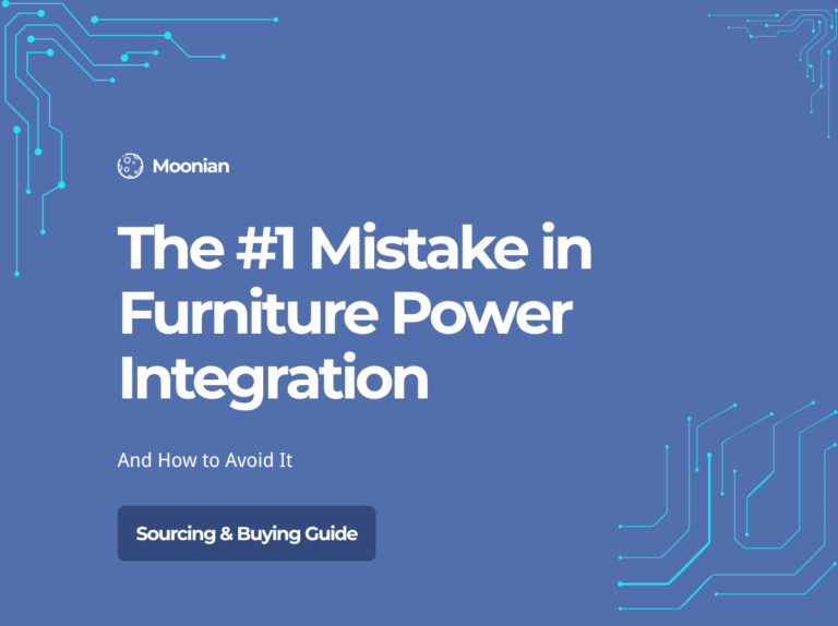 Furniture manufacturer integrating pop-up socket into desk design at the concept stage rather than as an afterthought