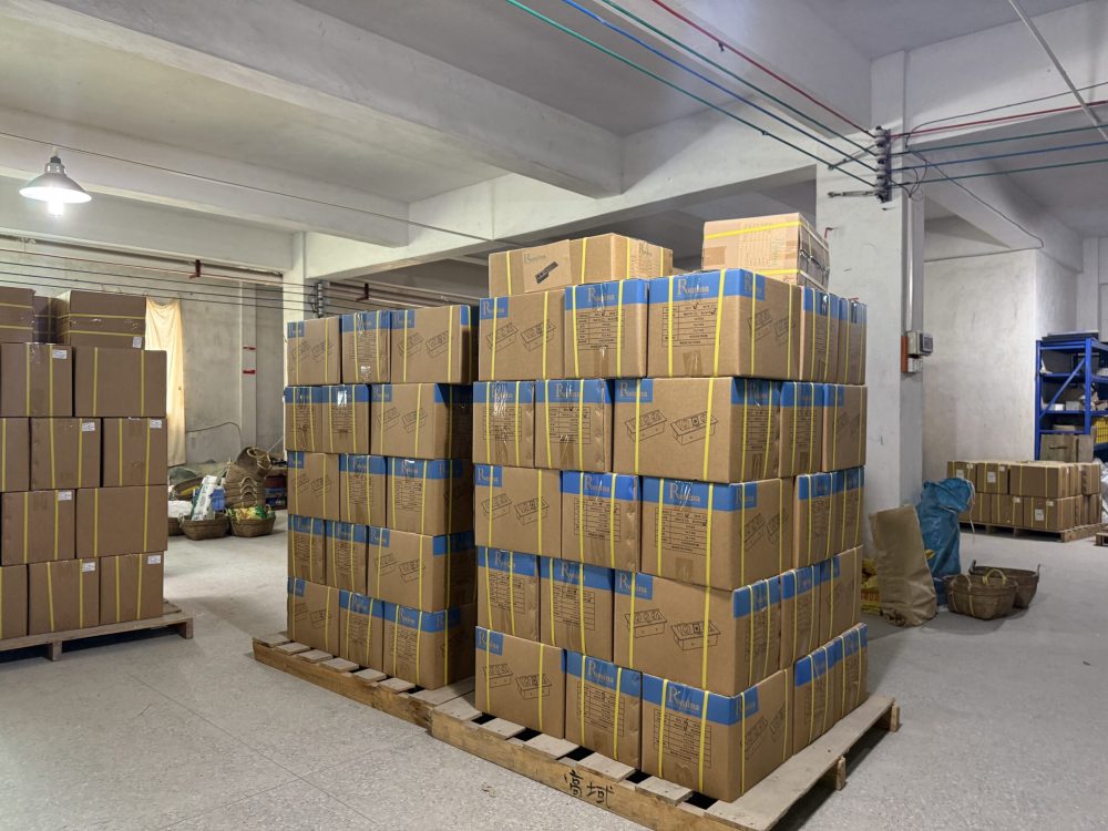 Ready stock warehouse with finished pop-up socket products in bulk packaging at Moonian factory